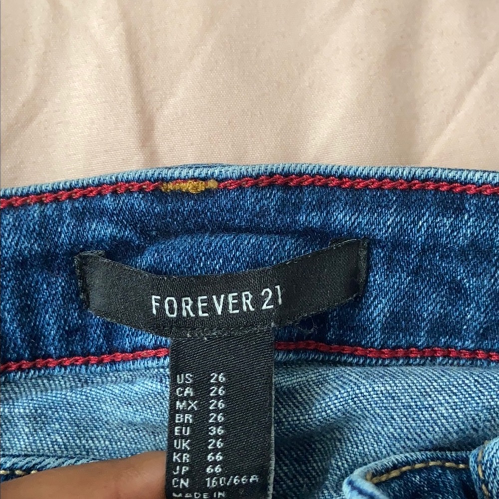 Knee Ripped Jeans - Picture 2 of 3
